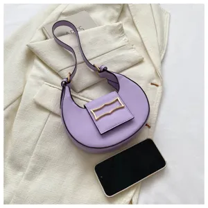 Chic purple crescent hobo shoulder bag with metal buckle, stylish minimalist PU leather purse for women.