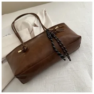 Vintage dark brown PU leather shoulder bag for women, large capacity daily tote and handbag.