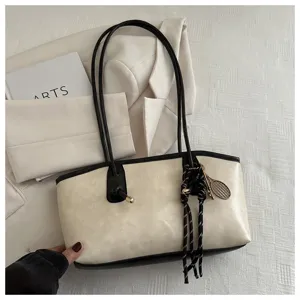 Elegant minimalist two-tone tote shoulder bag with slim straps and chic tennis racket charm.