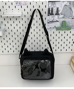 Detailed view of the cute cat ear ita bag with a clear front window for pins and merch displays.
