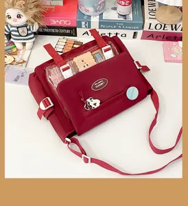 Cute Japanese college style girl messenger bag with clear window and cute bear plush charm detail.