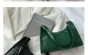 Green crocodile pattern baguette shoulder bag, stylish green PU leather purse detail view.