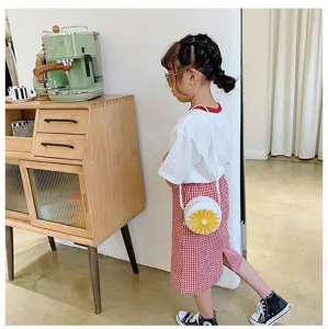 Cute kids mini crossbody bag with yellow daisy flower design on white round PU leather.