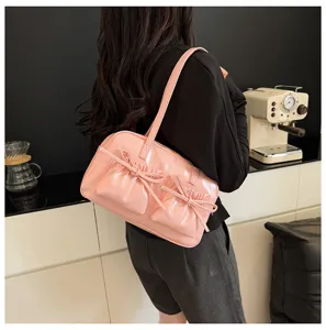 Trendy pink bow bowling shoulder bag, stylish underarm tote bag for women daily matching.