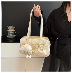 Gold metallic bowling shoulder bag with cute cloud pendant and bow detail for women chic