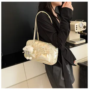 Chic metallic bowling shoulder bag with cute cloud pendant and bow detail for women.