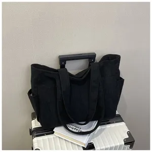 Black corduroy tote bag for women, large capacity shoulder bag for daily commuting and school.