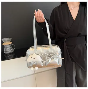 Silver metallic bowling bag with dual front pockets, cute bow and cloud plush pendant for women.