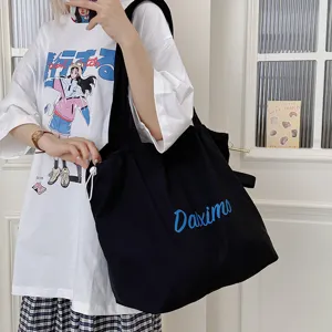 Casual canvas tote bag with drawstring, large capacity shoulder bag for daily commute.
