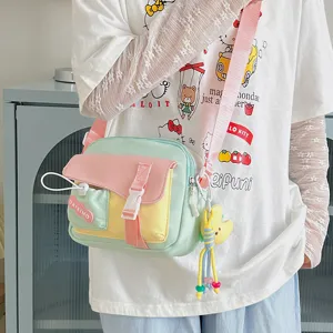Joli sac bandoulière colorblock pastel pour femmes, sac de téléphone en toile décontracté et léger.