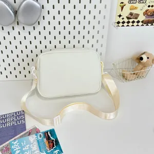 Minimalist white canvas crossbody bag, casual daily shoulder bag for students and teens.