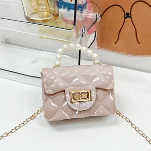 Mini roze gelei handtas met parelhandvat en ketting voor dames, chic en trendy dagelijks design.