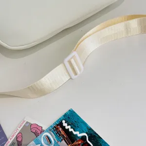 White canvas shoulder bag strap detail, stylish casual daily crossbody bag for students.
