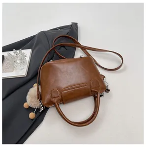 Women retro brown PU leather handbag minimalist crossbody shoulder bag with stylish charm accessory