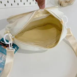 Japanese minimalist canvas crossbody bag, versatile student shoulder bag with zipper opening.