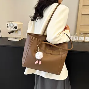 Vintage brown large capacity tote bag for women, stylish PU leather shoulder bag for daily work.