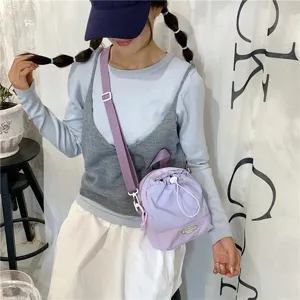 Casual mini crossbody bag for women, stylish summer shoulder bag with drawstring.