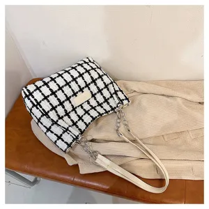 Black and white plaid tweed tote shoulder bag with chain strap for daily commute use