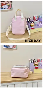 Pink nylon ita bag with clear window, cute shoulder crossbody handbag for anime fans students.