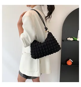 Chic black pleated shoulder bag for women, stylish underarm cloud bag with metal ring.