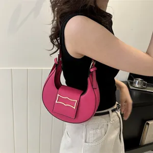 Stylish pink crescent hobo shoulder bag for women, trendy minimalist leather underarm purse.
