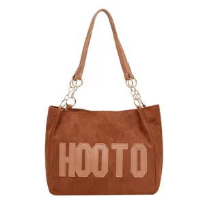 Brown suede tote bag for women, large capacity shoulder bag with chain strap and letters.