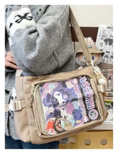 College style canvas messenger bag with transparent pocket for pins and kawaii anime pins daily use.