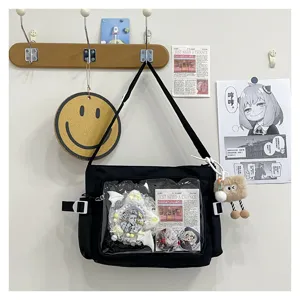Canvas messenger bag with clear front pocket for ita pins, stylish black daily crossbody.