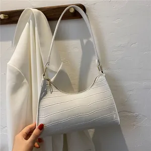 White crocodile embossed patent leather shoulder bag stylish minimalist underarm baguette bag.