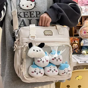Japanese style cute PU transparent ita bag shoulder handbag featuring lovely plush dolls display.