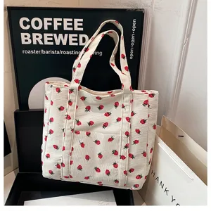 Cute strawberry print corduroy tote bag, versatile casual canvas shoulder bag for daily use.