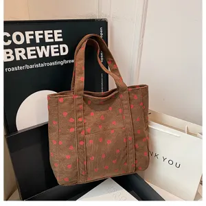 Brown corduroy tote bag with cute pink strawberry print. Large capacity shoulder bag for women.
