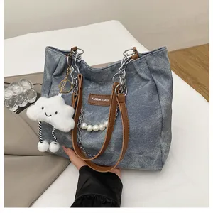 Casual large capacity denim tote bag with chain strap and cute cloud pendant for daily commuting