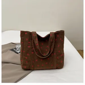 Brown corduroy strawberry print tote bag, casual daily shoulder bag for women and students.