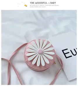 Kids pink round cross-body bag with cute white daisy flower, PU leather detail shot for daily wear