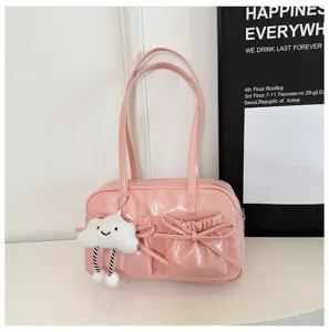 Pink patent leather bowling shoulder bag detail, sweet style with cute cloud pendant and bow.