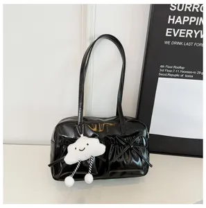 Black patent leather bowling shoulder bag with cute cloud pendant and stylish bow front pockets.
