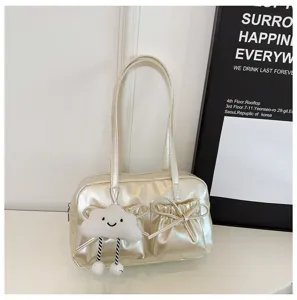 Stylish metallic bowling shoulder bag for women with cute bow pockets and cloud plush pendant.