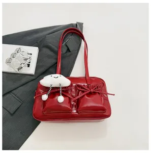 Red patent leather bowling bag with cute bow and cloud pendant for daily casual fashion.