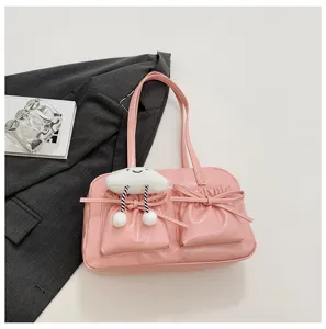 Pink patent leather bowling shoulder bag with cute bow pockets and soft cloud pendant.