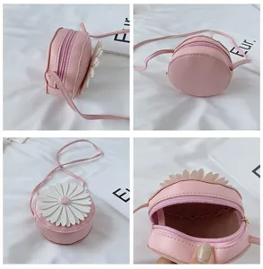 Cute pink round children crossbody bag with white daisy flower, PU leather toddler purse.