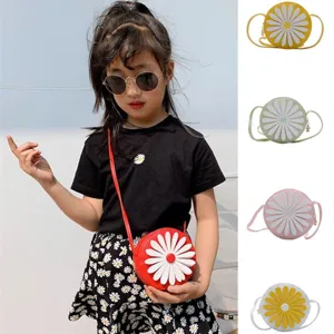Kids round daisy crossbody bag cute PU leather shoulder bag for little girls and boys daily use.