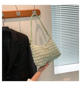 Light green bubble pleated shoulder bag cloud bag detailed view soft textured fabric daily style
