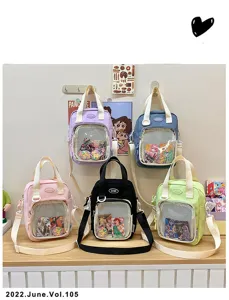 Cute pastel nylon ita bag with transparent front mesh window for pins and anime badges.