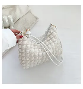 Stylish pleated cloud shoulder bag for women, trendy chic textured underarm bag.