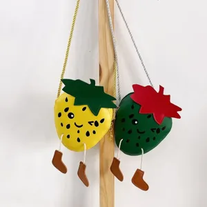 Kids mini strawberry crossbody bag detail, cute cartoon style small coin purse and shoulder bag.