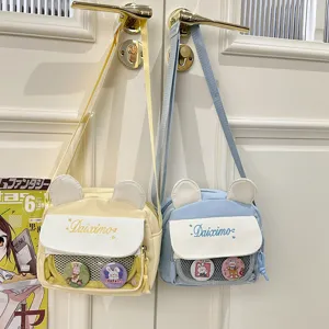 Cute canvas crossbody bag with bear ears and mesh front pocket, casual student shoulder bag.