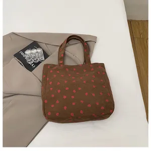 Brown corduroy tote bag with red strawberry print, large capacity casual shoulder bag for daily use.