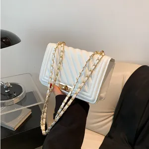 Chic white quilted chain shoulder bag for women, stylish crossbody handbag for daily wear.