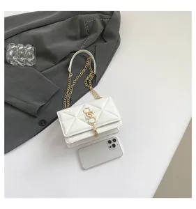 White quilted crossbody shoulder bag with gold chain strap, chic fashion handbag detail view.